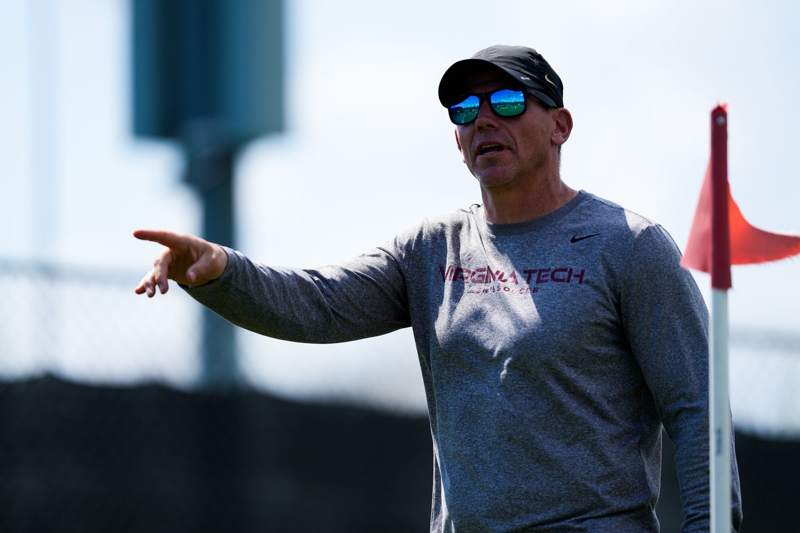 Associate head coach Kinney directing training